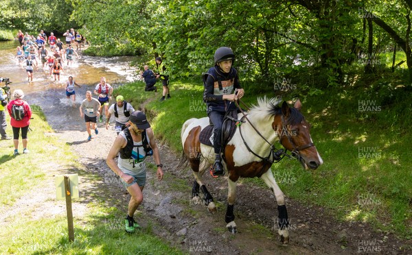 130626 - Man v Horse, Llanwrytd Wells - Competitors make their way around the course during the annual Man v Horse Race held at Llanwrytd Well, Powys, Wales