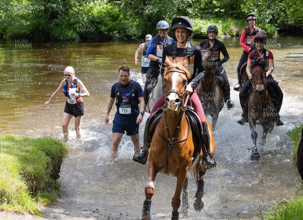 130626 - Man v Horse, Llanwrytd Wells - Competitors make their way around the course during the annual Man v Horse Race held at Llanwrytd Well, Powys, Wales