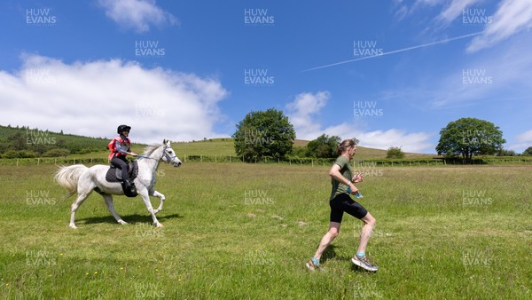 130626 - Man v Horse, Llanwrytd Wells - Competitors make their way around the course during the annual Man v Horse Race held at Llanwrytd Well, Powys, Wales