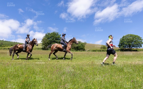 130626 - Man v Horse, Llanwrytd Wells - Competitors make their way around the course during the annual Man v Horse Race held at Llanwrytd Well, Powys, Wales