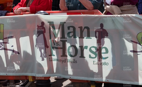 130626 - Man v Horse, Llanwrytd Wells - Competitors make their way around the course during the annual Man v Horse Race held at Llanwrytd Well, Powys, Wales