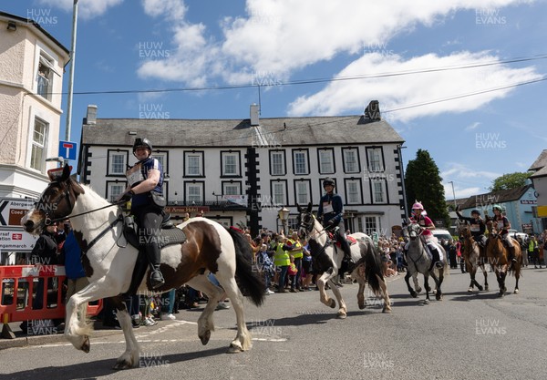 130626 - Man v Horse, Llanwrytd Wells - Riders and their horses set off at the start of  the annual Man v Horse Race held at Llanwrytd Well, Powys, Wales