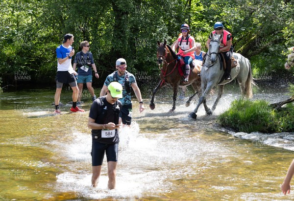 130626 - Man v Horse, Llanwrytd Wells - Competitors make their way around the course during the annual Man v Horse Race held at Llanwrytd Well, Powys, Wales