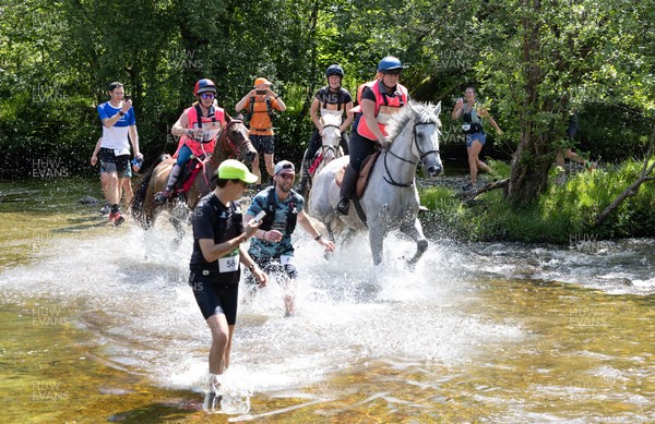 130626 - Man v Horse, Llanwrytd Wells - Competitors make their way around the course during the annual Man v Horse Race held at Llanwrytd Well, Powys, Wales