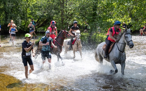 130626 - Man v Horse, Llanwrytd Wells - Competitors make their way around the course during the annual Man v Horse Race held at Llanwrytd Well, Powys, Wales