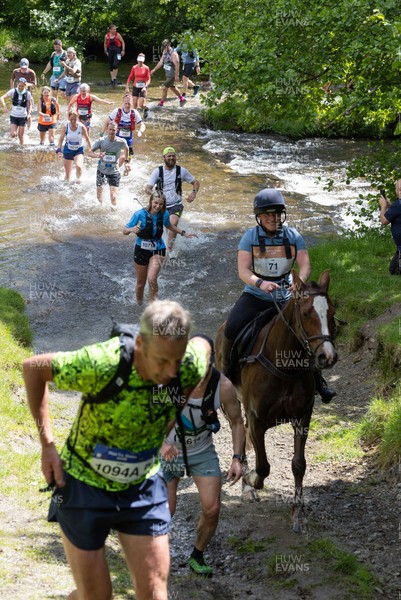 130626 - Man v Horse, Llanwrytd Wells - Competitors make their way around the course during the annual Man v Horse Race held at Llanwrytd Well, Powys, Wales