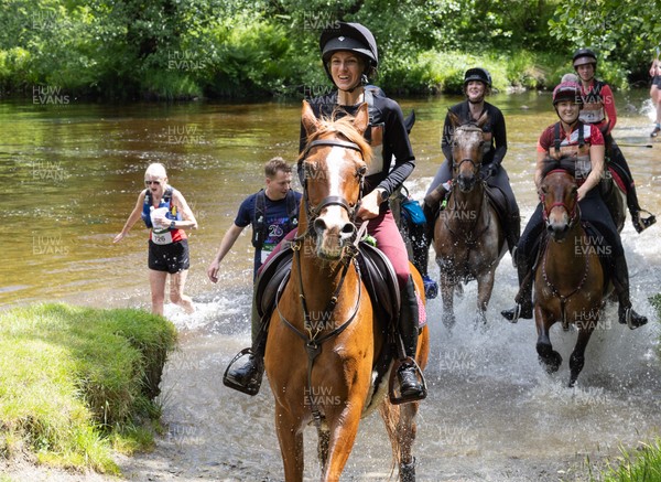 130626 - Man v Horse, Llanwrytd Wells - Competitors make their way around the course during the annual Man v Horse Race held at Llanwrytd Well, Powys, Wales