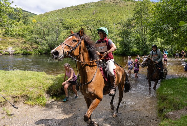 130626 - Man v Horse, Llanwrytd Wells - Competitors make their way around the course during the annual Man v Horse Race held at Llanwrytd Well, Powys, Wales