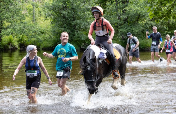 130626 - Man v Horse, Llanwrytd Wells - Competitors make their way around the course during the annual Man v Horse Race held at Llanwrytd Well, Powys, Wales
