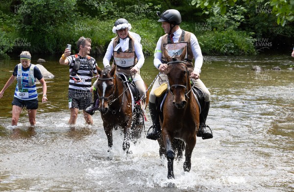 130626 - Man v Horse, Llanwrytd Wells - Newly married Nigel and Saffron Griffin, who married before the start of the race at the annual Man v Horse Race held at Llanwrytd Well, Powys, Wales