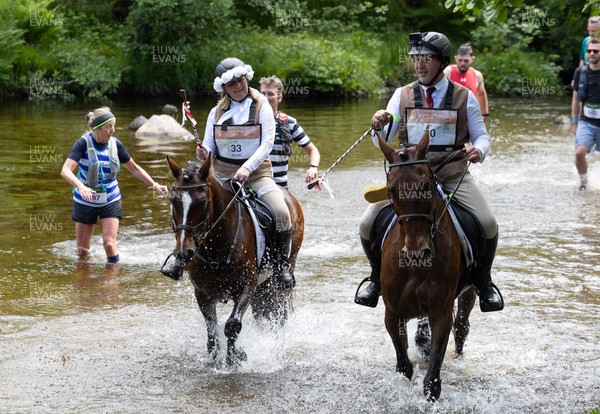 130626 - Man v Horse, Llanwrytd Wells - Newly married Nigel and Saffron Griffin, who married before the start of the race at the annual Man v Horse Race held at Llanwrytd Well, Powys, Wales