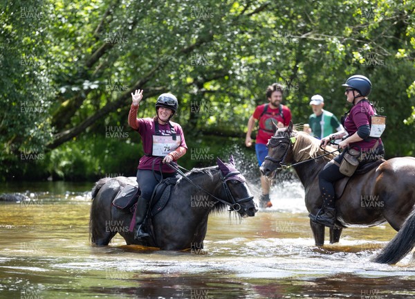 130626 - Man v Horse, Llanwrytd Wells - Competitors make their way around the course during the annual Man v Horse Race held at Llanwrytd Well, Powys, Wales