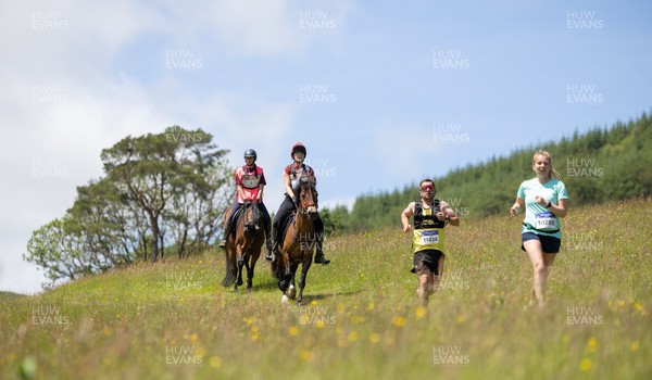 130626 - Man v Horse, Llanwrytd Wells - Competitors make their way around the course during the annual Man v Horse Race held at Llanwrytd Well, Powys, Wales