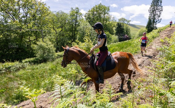 130626 - Man v Horse, Llanwrytd Wells - Competitors make their way around the course during the annual Man v Horse Race held at Llanwrytd Well, Powys, Wales