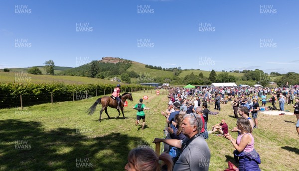 130626 - Man v Horse, Llanwrytd Wells - Competitors make their way around the course during the annual Man v Horse Race held at Llanwrytd Well, Powys, Wales