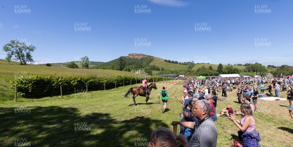 130626 - Man v Horse, Llanwrytd Wells - Competitors make their way around the course during the annual Man v Horse Race held at Llanwrytd Well, Powys, Wales