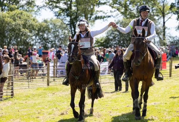 130626 - Man v Horse, Llanwrytd Wells - Newly married Nigel and Saffron Griffin, who married before the start of the race at the end of annual Man v Horse Race held at Llanwrytd Well, Powys, Wales