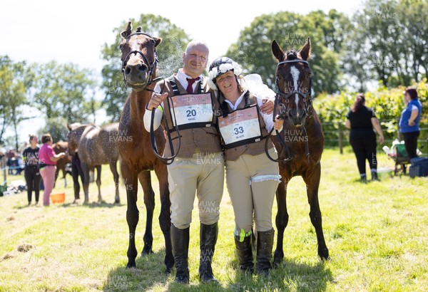 130626 - Man v Horse, Llanwrytd Wells - Newly married Nigel and Saffron Griffin, who married before the start of the race at the end of annual Man v Horse Race held at Llanwrytd Well, Powys, Wales