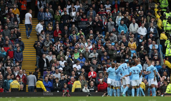 220418 - Manchester City v Swansea - Premier League - Swansea fans watch as Manchester City celebrate their second goal