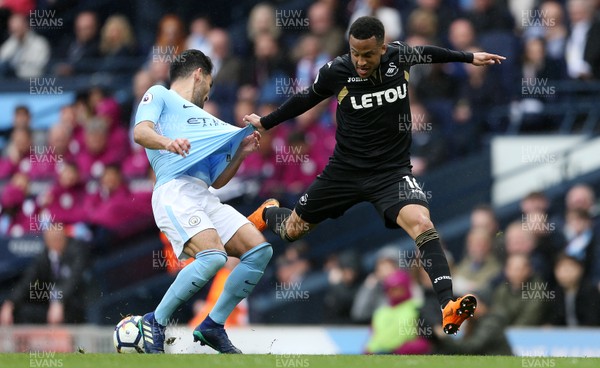 220418 - Manchester City v Swansea - Premier League - Martin Olsson of Swansea is tackled by Ilkay Gundogan of Manchester City