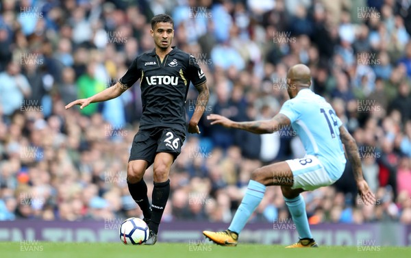 220418 - Manchester City v Swansea - Premier League - Kyle Naughton of Swansea is challenged by Fabian Delph of Manchester City