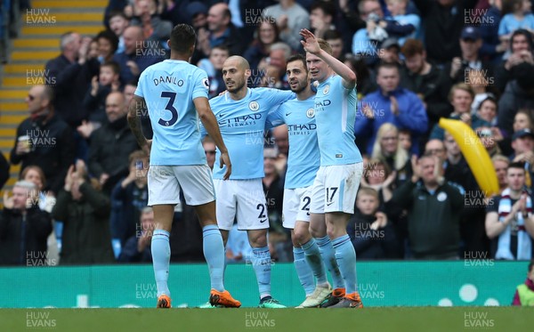 220418 - Manchester City v Swansea - Premier League - Kevin De Bruyne of Manchester City celebrates scoring a goal with team mates