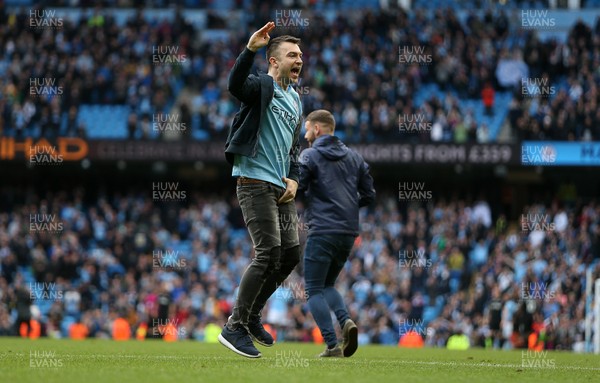 220418 - Manchester City v Swansea - Premier League - Supporters invade the pitch at full time to celebrate