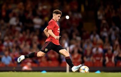 030819 - Manchester United v AC Milan - International Champions Cup - Daniel James of Manchester United scores the winning penalty