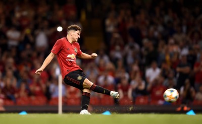 030819 - Manchester United v AC Milan - International Champions Cup - Daniel James of Manchester United scores the winning penalty