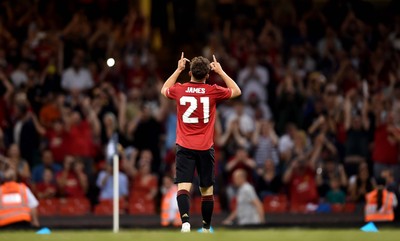 030819 - Manchester United v AC Milan - International Champions Cup - Daniel James of Manchester United scores the winning penalty