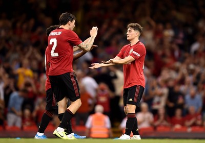 030819 - Manchester United v AC Milan - International Champions Cup - Daniel James of Manchester United scores the winning penalty