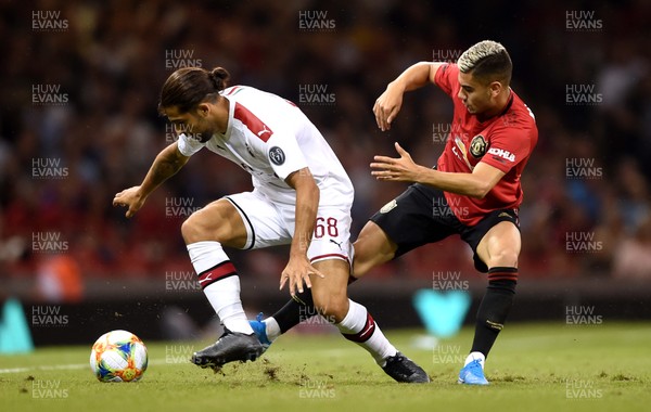 030819 - Manchester United v AC Milan - International Champions Cup - Ricardo Rodriguez of AC Milan is tackled by Andreas Pereira of Manchester United