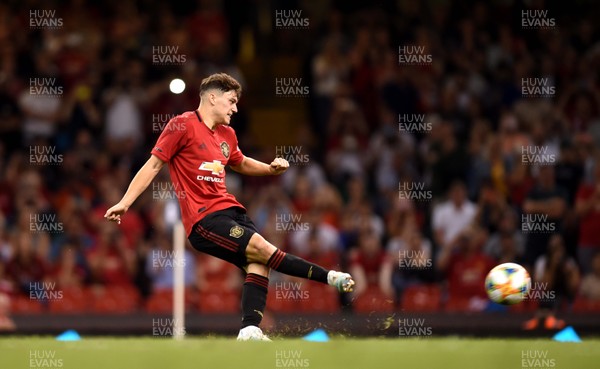 030819 - Manchester United v AC Milan - International Champions Cup - Daniel James of Manchester United scores the winning penalty