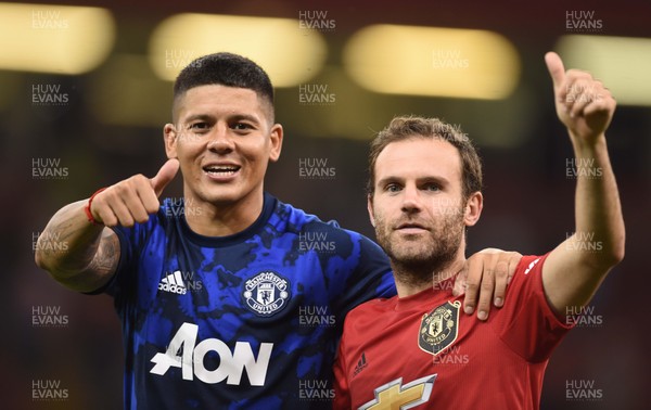 030819 - Manchester United v AC Milan - International Champions Cup - Marcos Rojo and Juan Mata of Manchester United at the end of the game