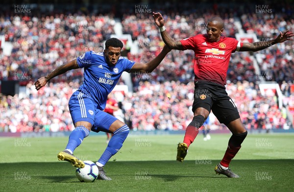 120519 - Manchester United v Cardiff City - Premier League - Nathaniel Mendez-Laing of Cardiff City is challenged by Ashley Young of Manchester United