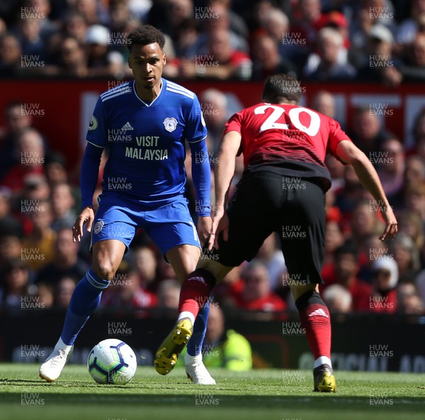 120519 - Manchester United v Cardiff City - Premier League - Josh Murphy of Cardiff City is challenged by Diogo Dalot of Manchester United