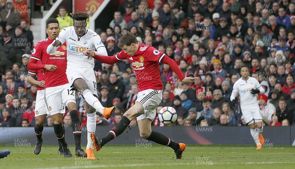 310318 - Manchester United v Swansea City - Premier League -  Tammy Abraham of Swansea tries a shot on goal