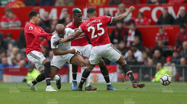 310318 - Manchester United v Swansea City - Premier League -  Paul Pogba of Manchester United and Andre Ayew of Swansea