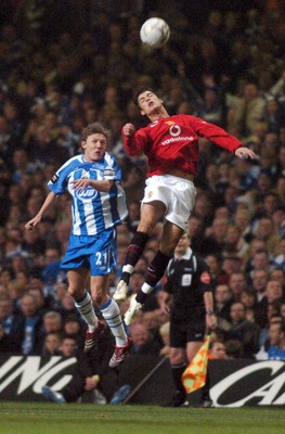 260206 - Manchester United v Wigan Athletic - Carling Cup Final - Man Utd's Cristiano Ronaldo and  Jimmy Bullard reach for high ball