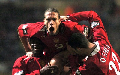 260206 - Manchester United v Wigan Athletic - Carling Cup Final - Man Utd's Rio Ferdinand celebrates Cristiano Ronaldo's goal