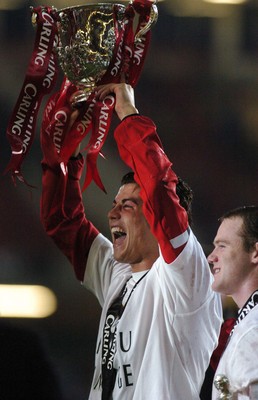 260206 - Manchester United v Wigan Athletic - Carling Cup Final - Manchester United Cristiano Ronaldo and Wayne Rooney celebrate winning the Carling Cup