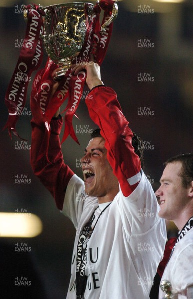 260206 - Manchester United v Wigan Athletic - Carling Cup Final - Manchester United Cristiano Ronaldo and Wayne Rooney celebrate winning the Carling Cup