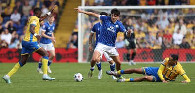 020526 - Mansfield Town v Cardiff City - Sky Bet League 1 - Rubin Colwill of Cardiff is challenged by Deji Oshilaja of Mansfield