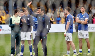 020526 - Mansfield Town v Cardiff City - Sky Bet League 1 - Manager Brian Barry-Murphy of Cardiff salutes the travelling fans