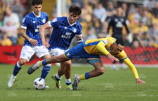 020526 - Mansfield Town v Cardiff City - Sky Bet League 1 - Rubin Colwill of Cardiff is challenged by Deji Oshilaja of Mansfield