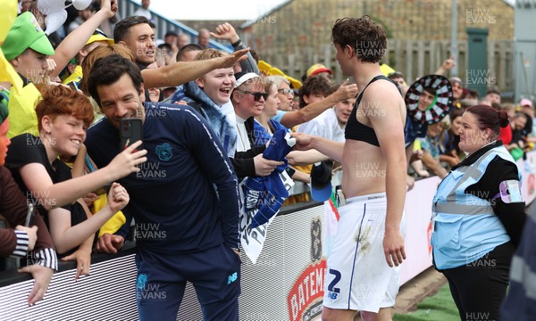 020526 - Mansfield Town v Cardiff City - Sky Bet League 1 - Fan gets Will Fish shirt as fan takes selfie with Cardiff City head coach Brian Barry-Murphy 