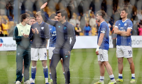 020526 - Mansfield Town v Cardiff City - Sky Bet League 1 - Manager Brian Barry-Murphy of Cardiff salutes the travelling fans