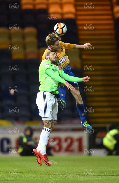 160118 - Mansfield Town v Cardiff City - FA Cup - Callum Paterson of Cardiff City and Danny Rose of Mansfield Town compete in the air
