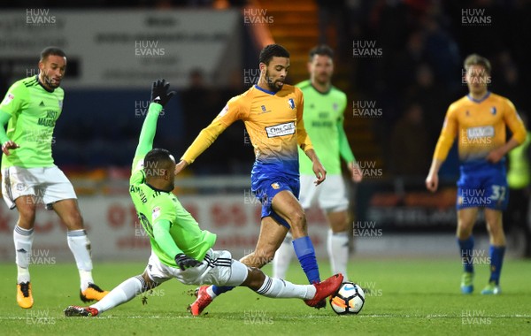 160118 - Mansfield Town v Cardiff City - FA Cup - CJ Hamilton of Mansfield Town is tackled by Loic Damour of Cardiff City