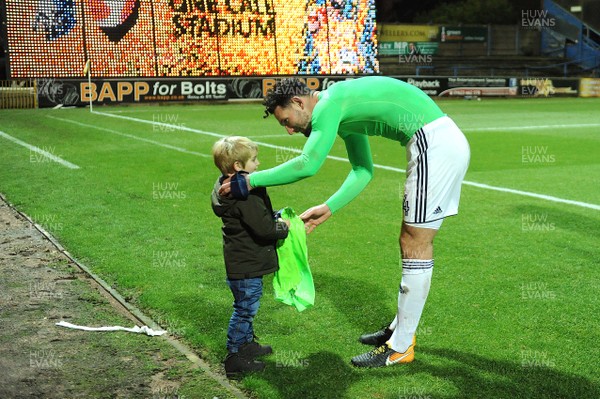160118 - Mansfield Town v Cardiff City - FA Cup - Sean Morrison of Cardiff City presents a young fan with his shirt at the end of the game